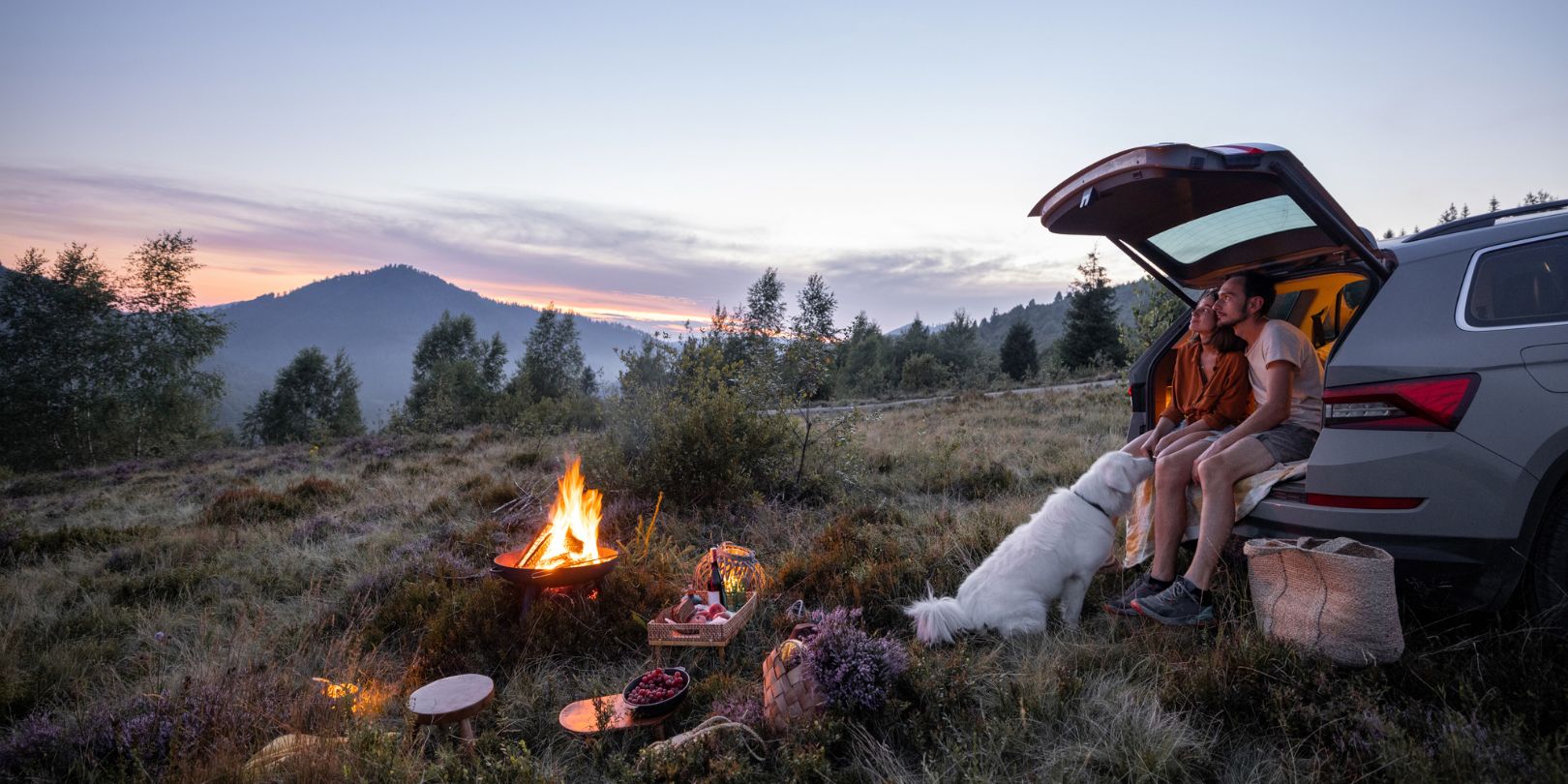 Couple with Car Camping in the Mountains